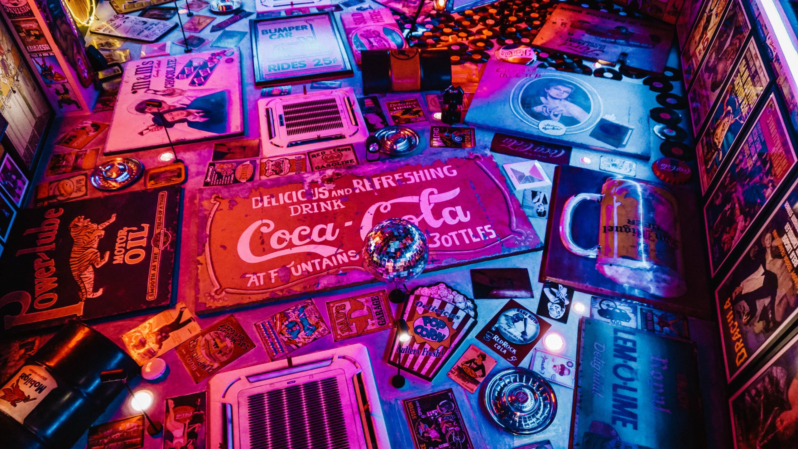 Canva-Red-Coca-cola-Signage-Surrounded-by-Other-Signages-scaled.jpg